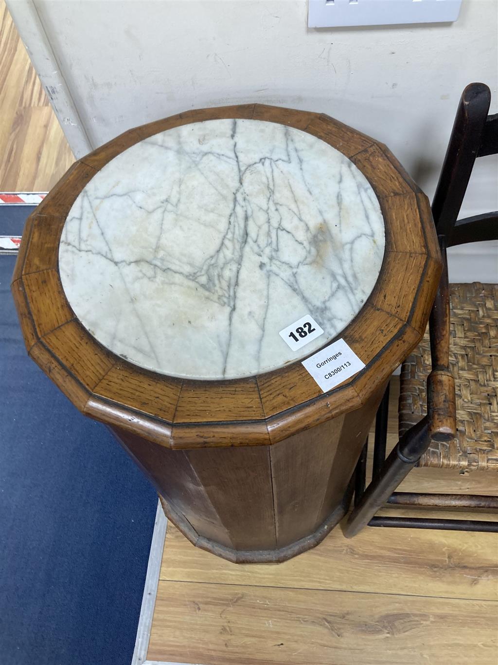 A Victorian oak marble top cylinder bedside cabinet, diameter 40cm height 77cm